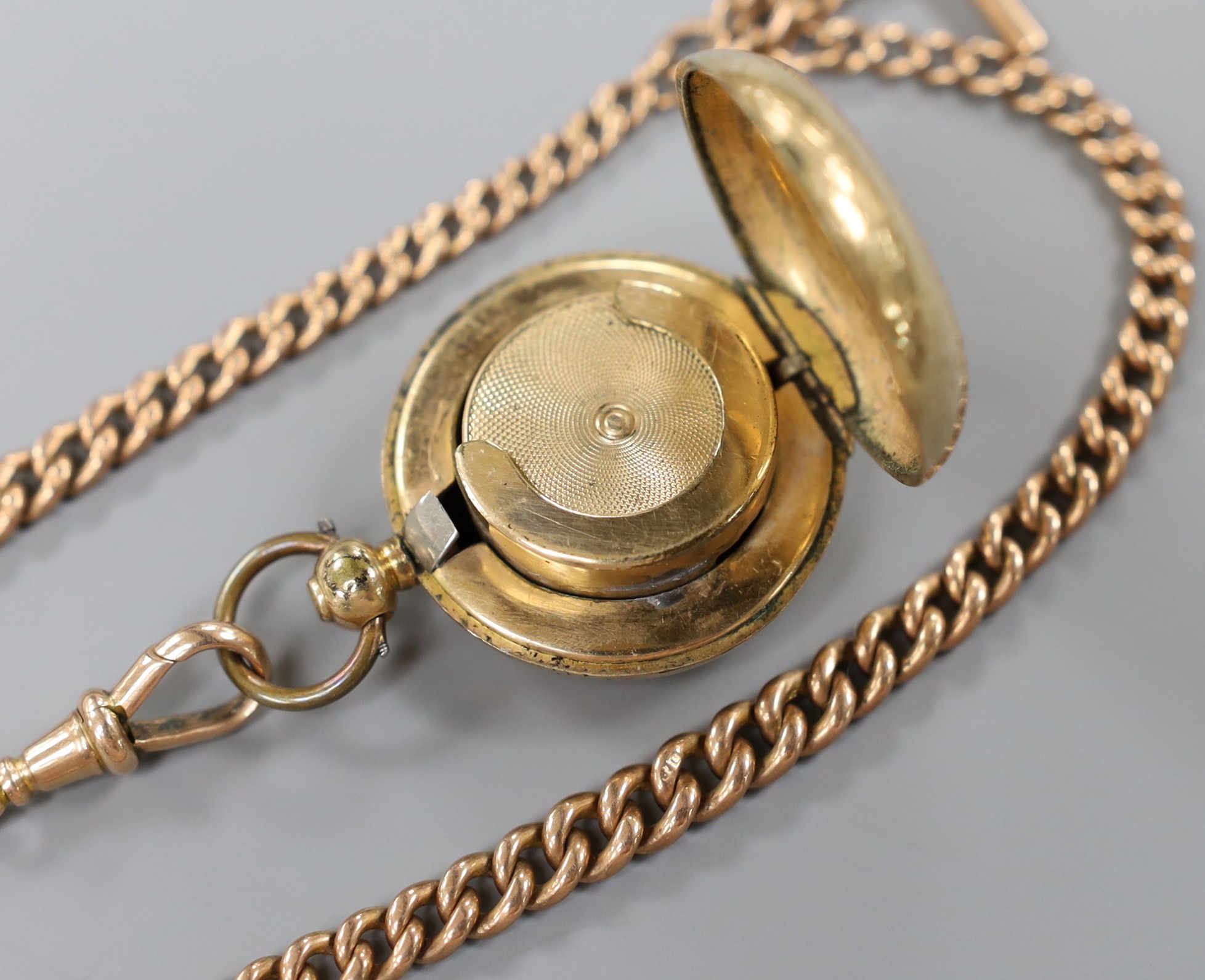 A gold plated sovereign case, together with a 9ct gold albert, 43cm, 37 grams.